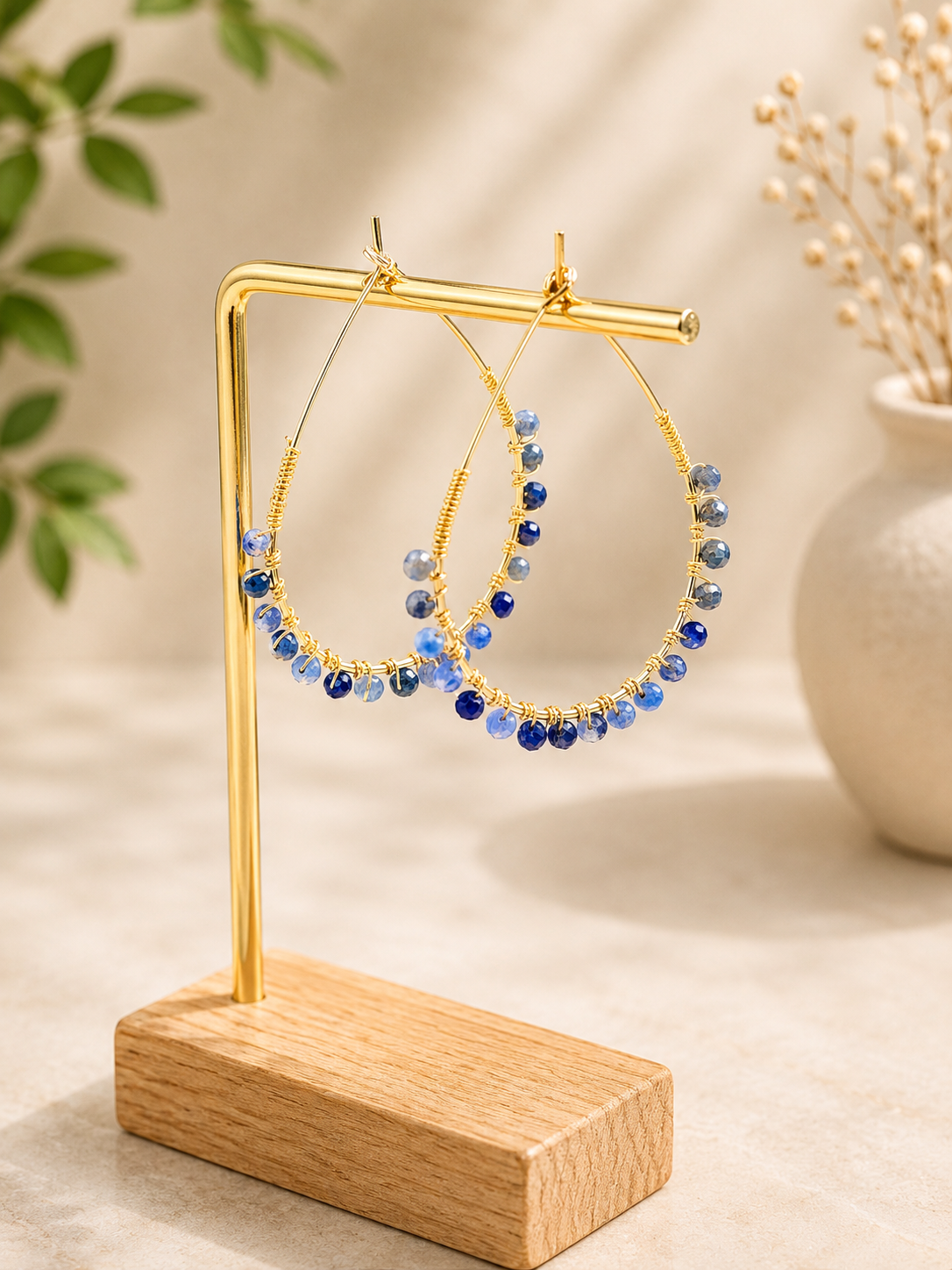 Tear drop hoops with Lapis Lazuli faceted stones, gold plated
